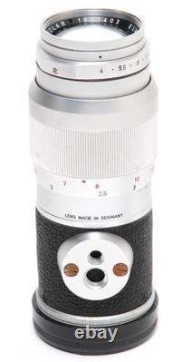 Leica Leitz Elmar 4/135 mm lens with caps