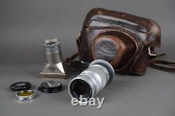 Lot of Leica / Leitz accessories 4/90 Elmar lens, case, filters, slide viewer