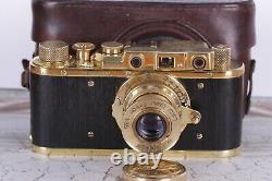 Vintage camera Leica D. R. P 35 mm Leitz Elmar lens f = 5, 13.5 Wooden Edition